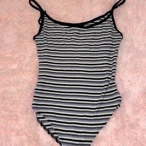 black white and grey striped body suit